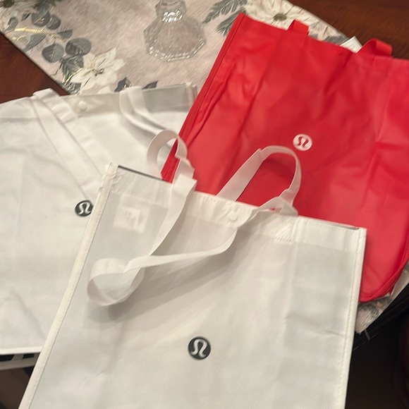 lululemon athletica Other - Three medium lululemon shopping bags. Great for packing gifts